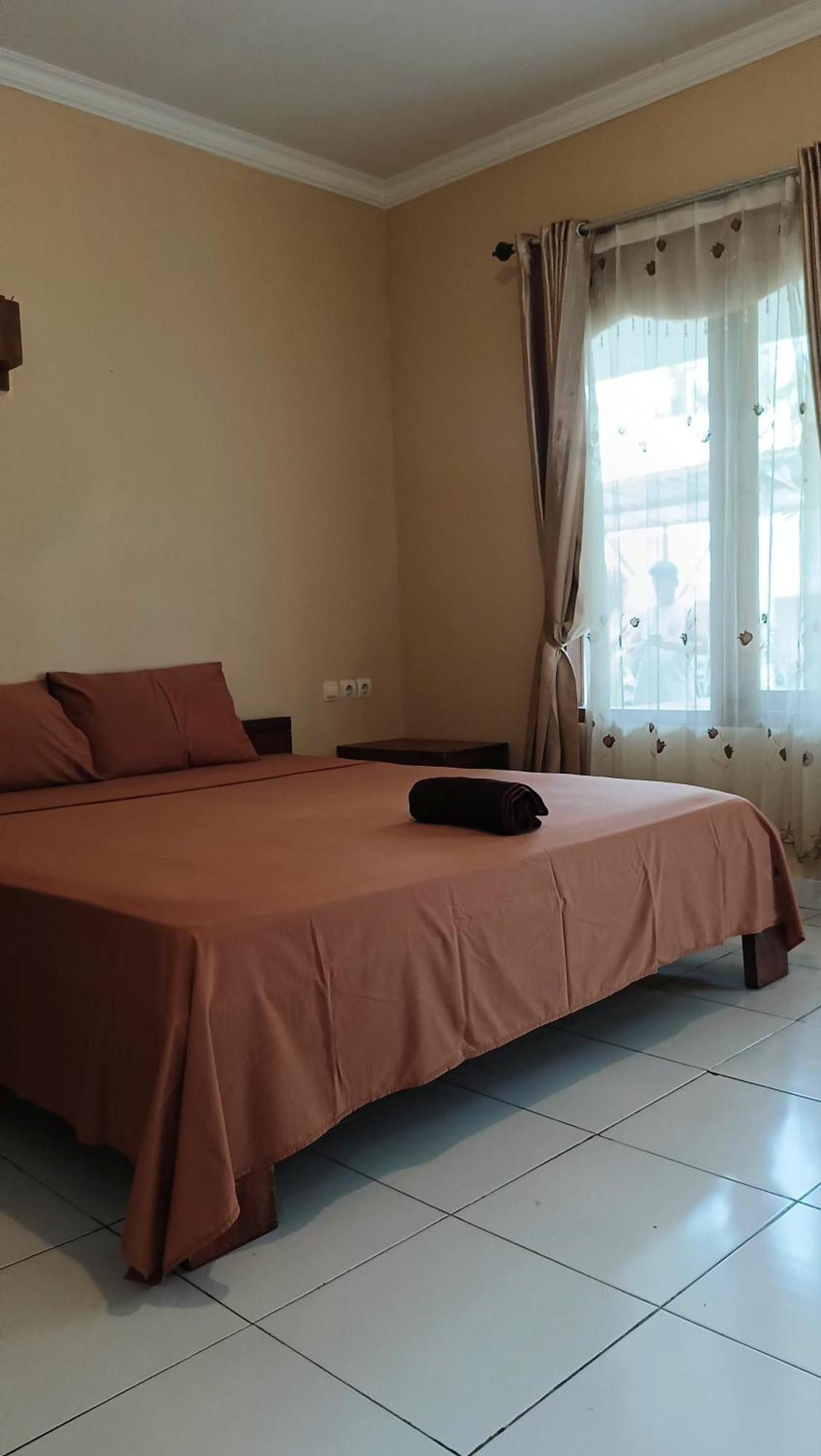 Tiga Spies Hostel Kuta  エクステリア 写真